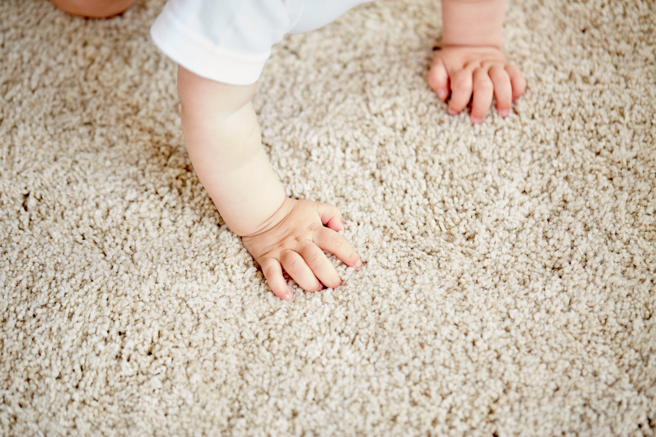 baby on carpet